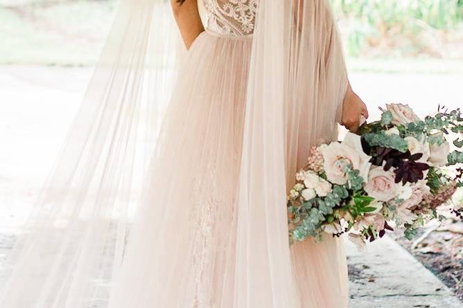 Lace gown with tulle cape