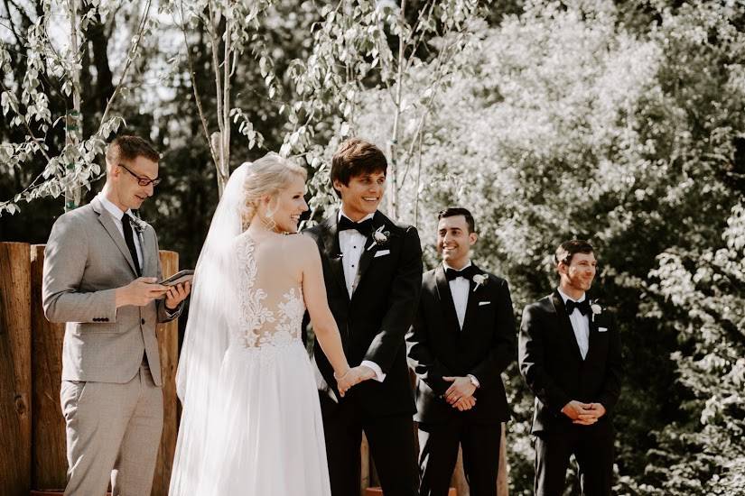 Couple holding hands at ceremony