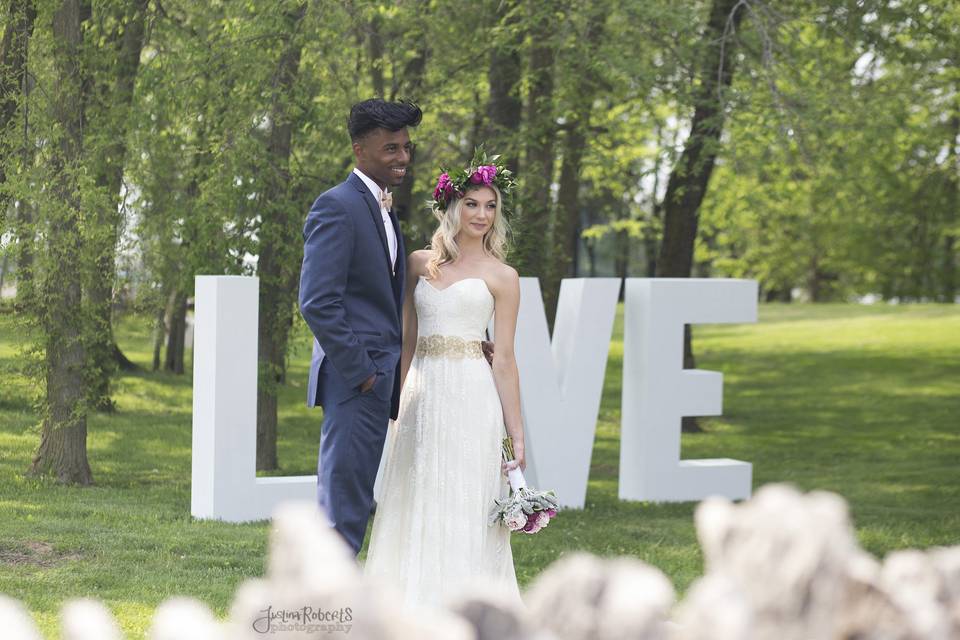 Bridal gown provided by Trousseau Bridal. Men's attire provided by Romanoff's Classic Tuxedo.Irongate Equestrian Center - Inspiration Shoot. Organized by Carmen Hall of Forget Me Knot Photography with  Prema Designs-Wedding and Event Design. Image by Justina Roberts Photography.