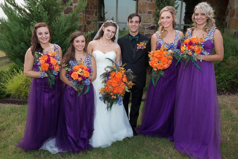 The couple with their bridesmaids and groomsmen