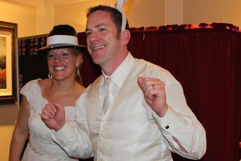 Our Bride & Groom coming out of our Photo-Booth!