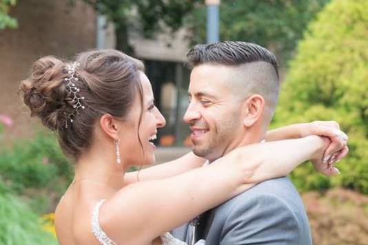 Newlyweds by the grand piano