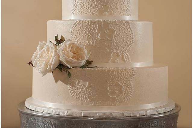 White rose on wedding cake