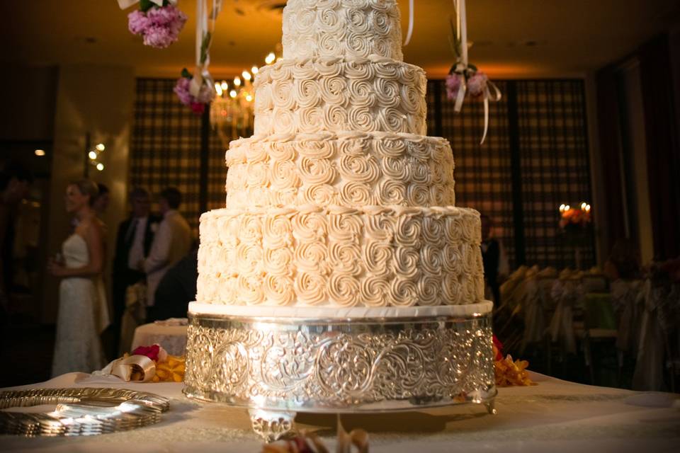 White rose on wedding cake