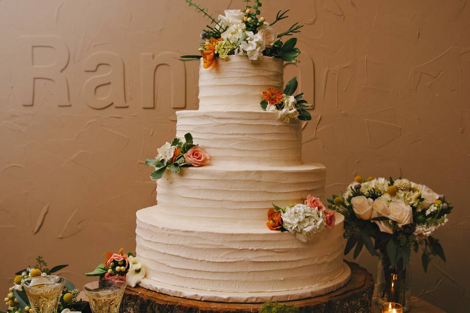 Wedding cake on wooden platform