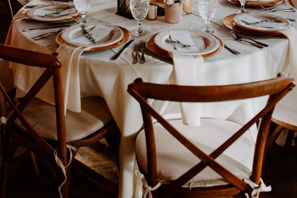 Tables with lanterns and flowers