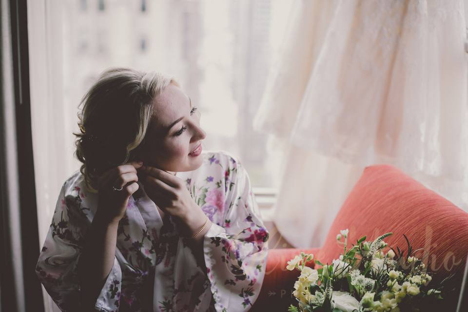 Bride wearing her earring