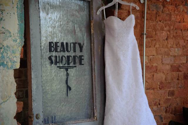 The wedding gown hanging up