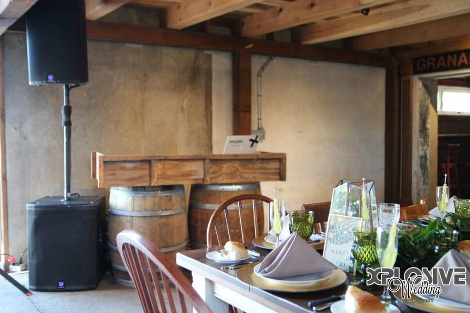 Rustic barrel DJ booth.