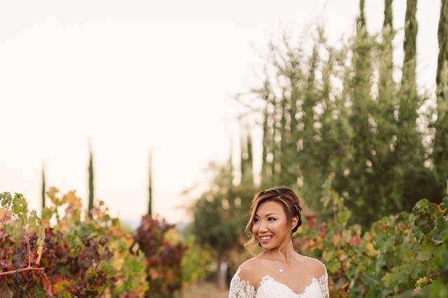 Bride along a vineyard