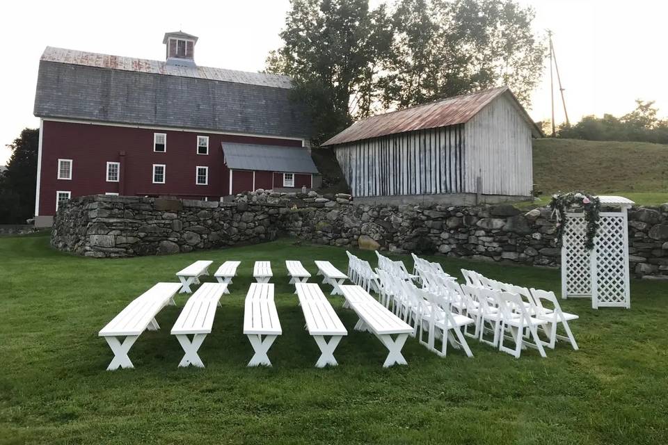 By white barn ceremony