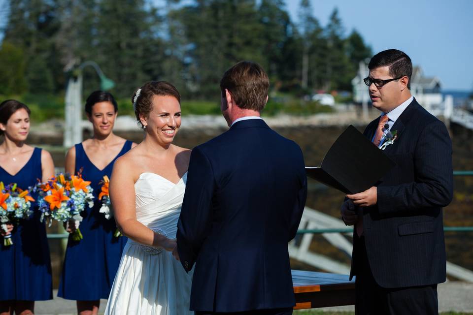 Officiating the marriage. Photo by Kate Crabtree Photography.