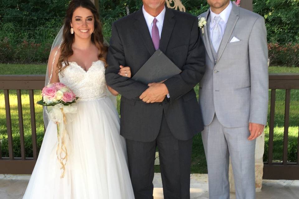 Newlyweds and the officiant