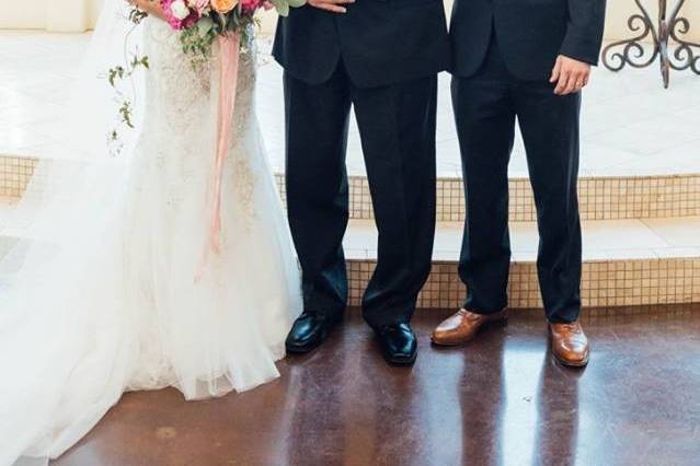 Couple with the officiant