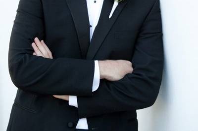 The groom poses for a portrait before the ceremony.