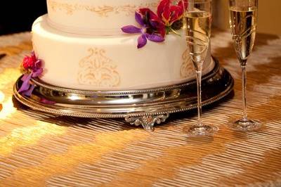 A beautiful cake is a sweet addition for an elegant reception.