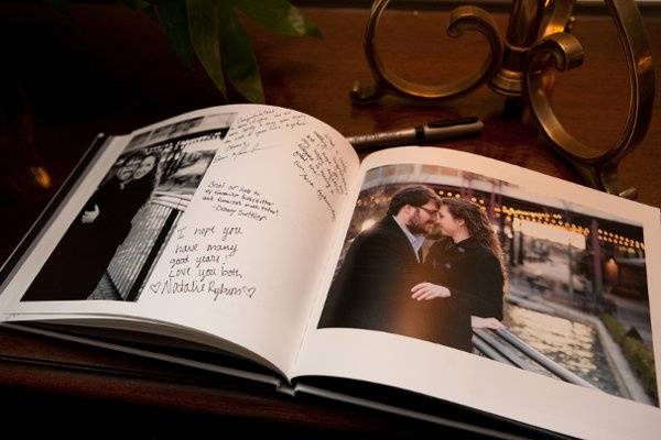A custom made sign-in engagement session book by Jessica Lobdell Photography was used as the guest registry at the wedding.