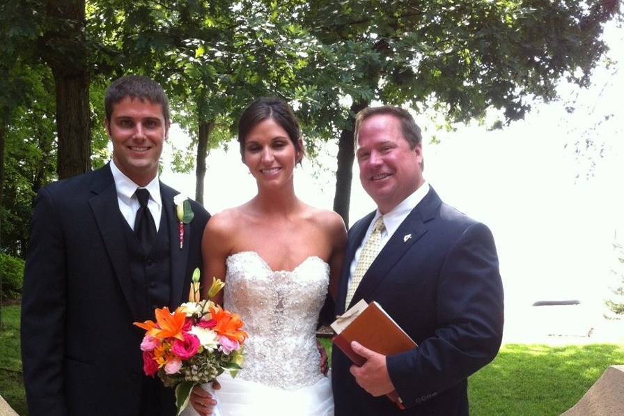 Officiant and the newlyweds