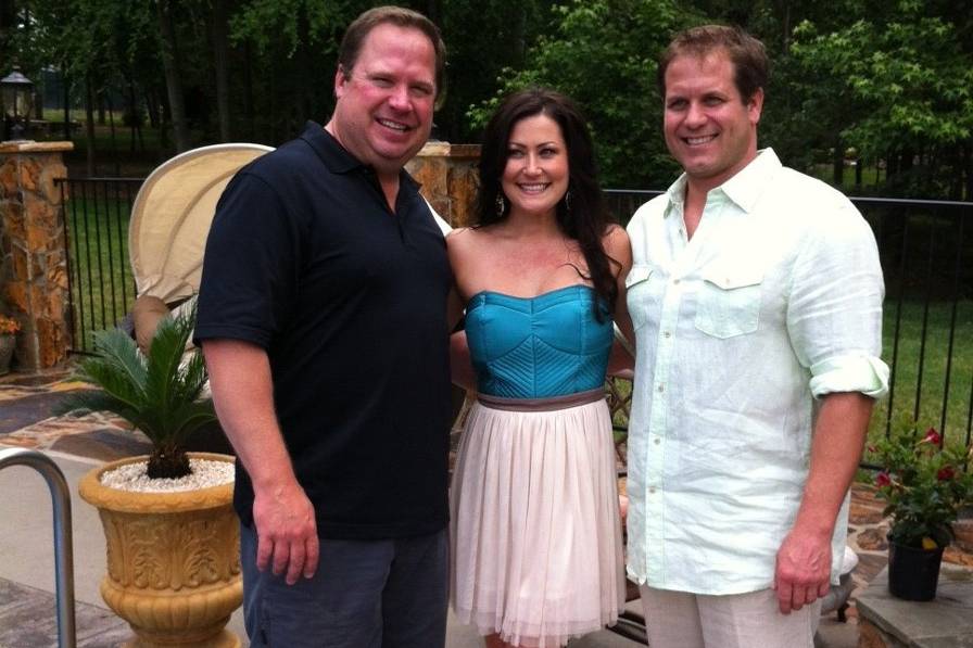 Officiant and the couple in casual clothes