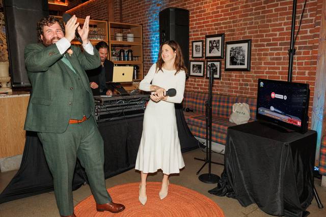 Bride and groom karaoke