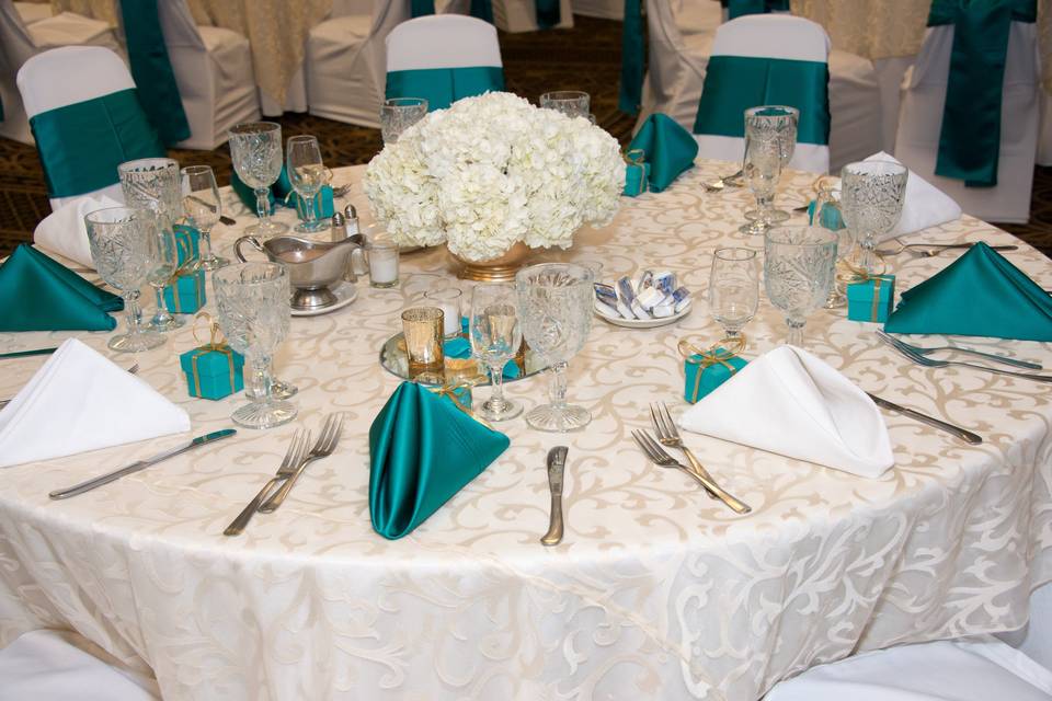 Table setting and teal decor