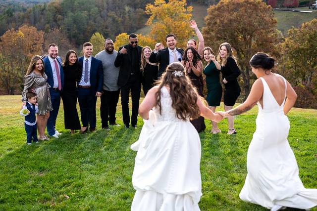 Excited friends welcome brides