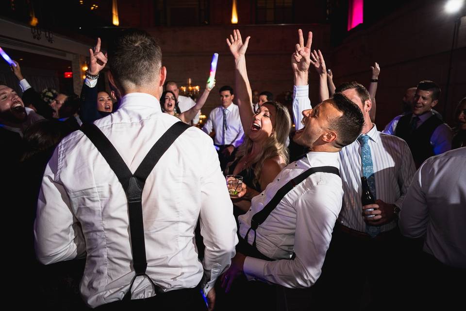 Grooms on dancefloor