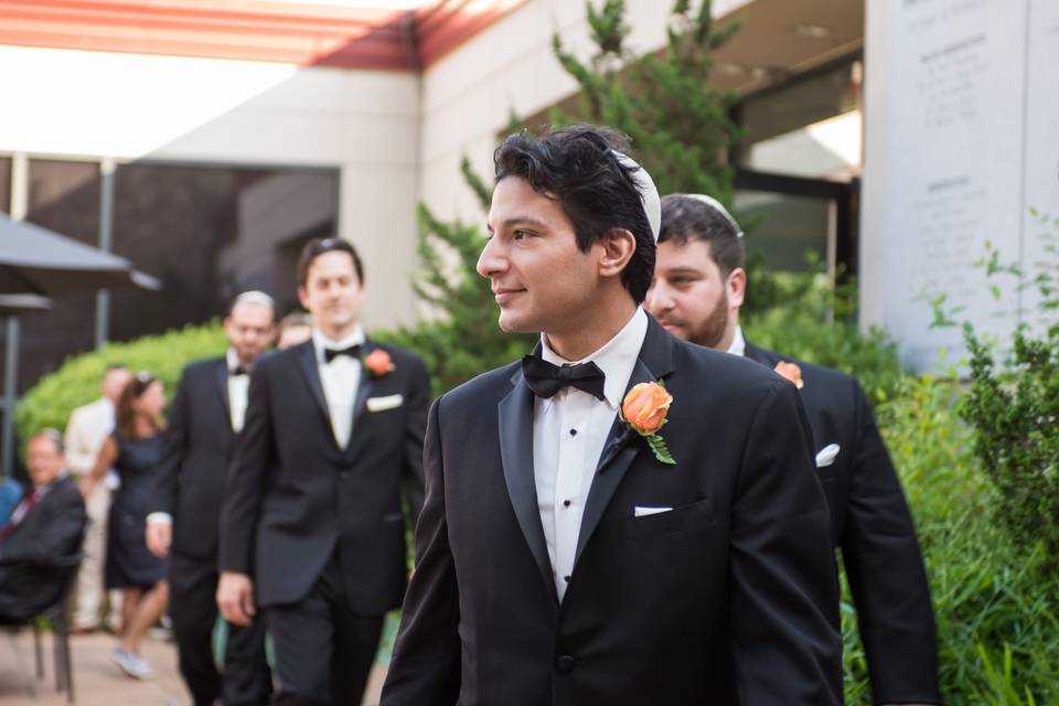 Some groomsmen strutting