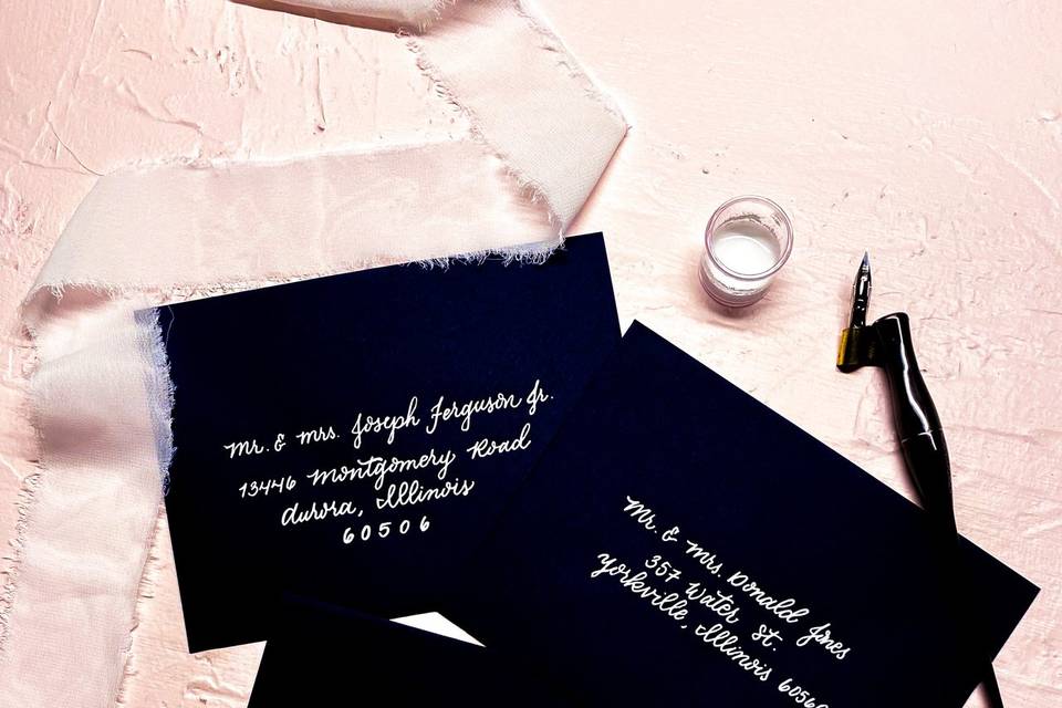 Dark envelope with white ink