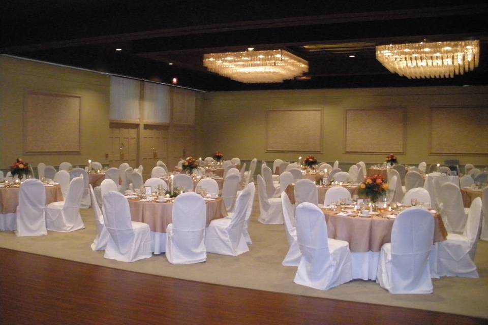 Our Ballroom accomodates up to 235 guests with our huge built-in dance floor uninhibited.  Pictured here is a Fall Wedding Reception.