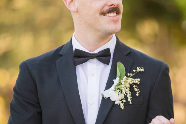 Groom's finishing touches
