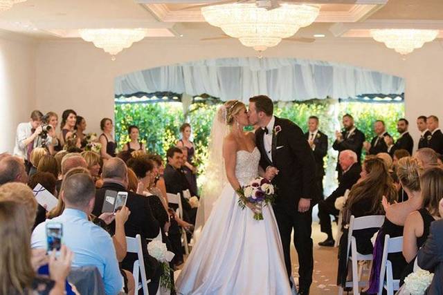Newlyweds kissing