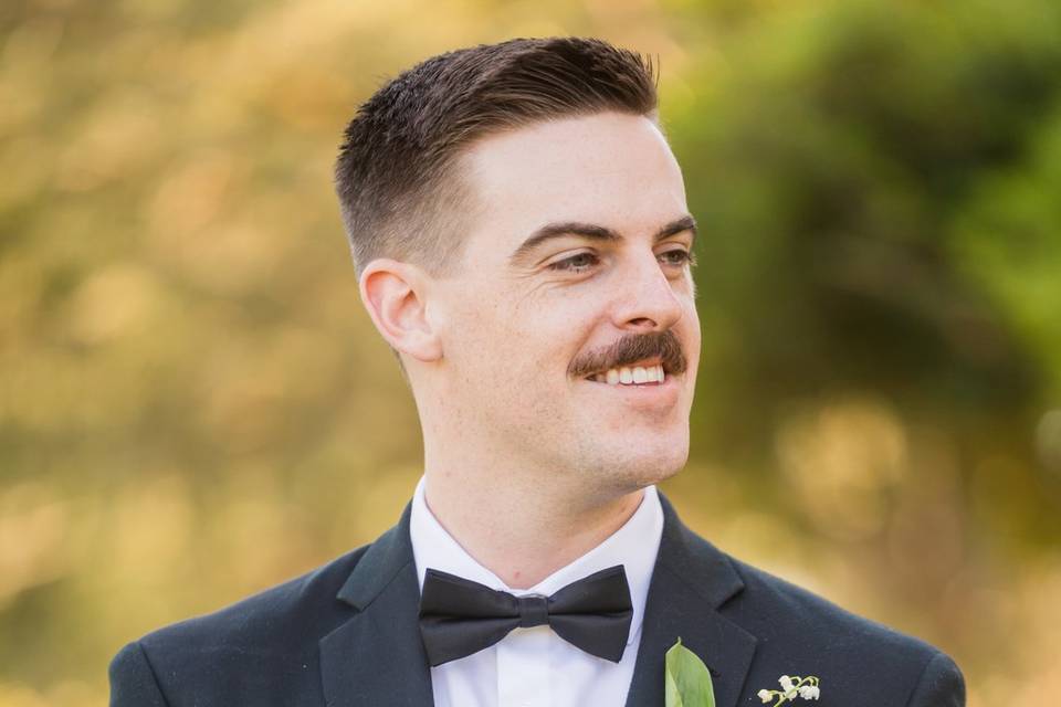 Groom's finishing touches