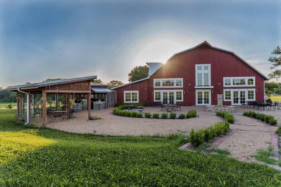 Sun shining behind the barn