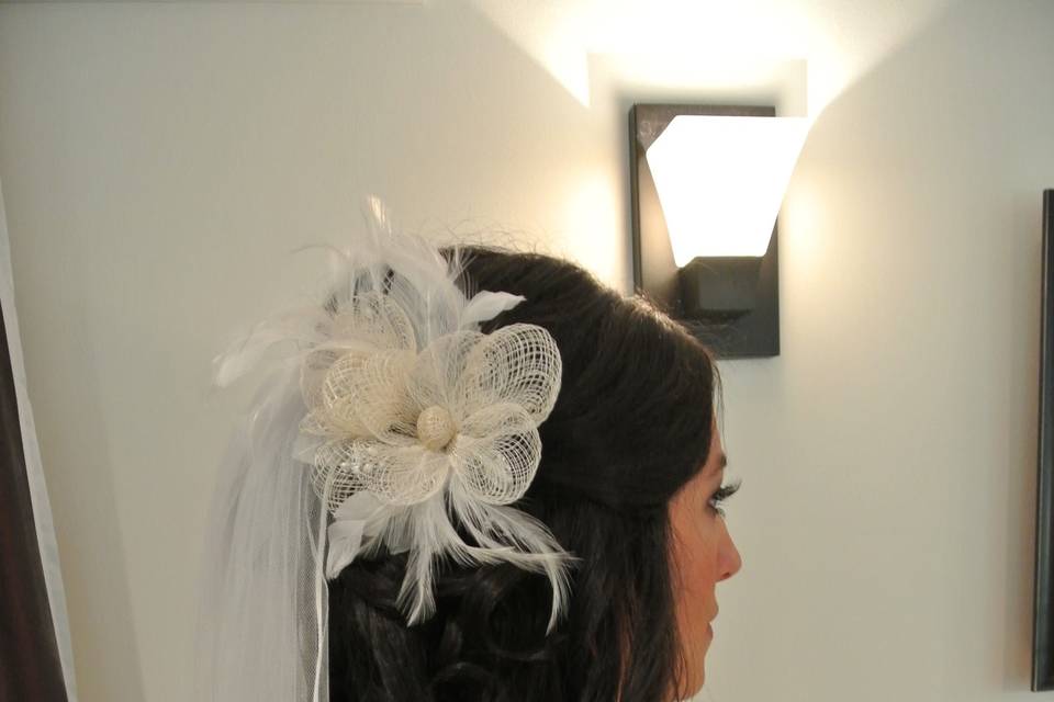 Gorgeous Bride with a feathered flower vail!