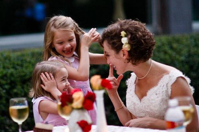 The bride with the kids at the wedding