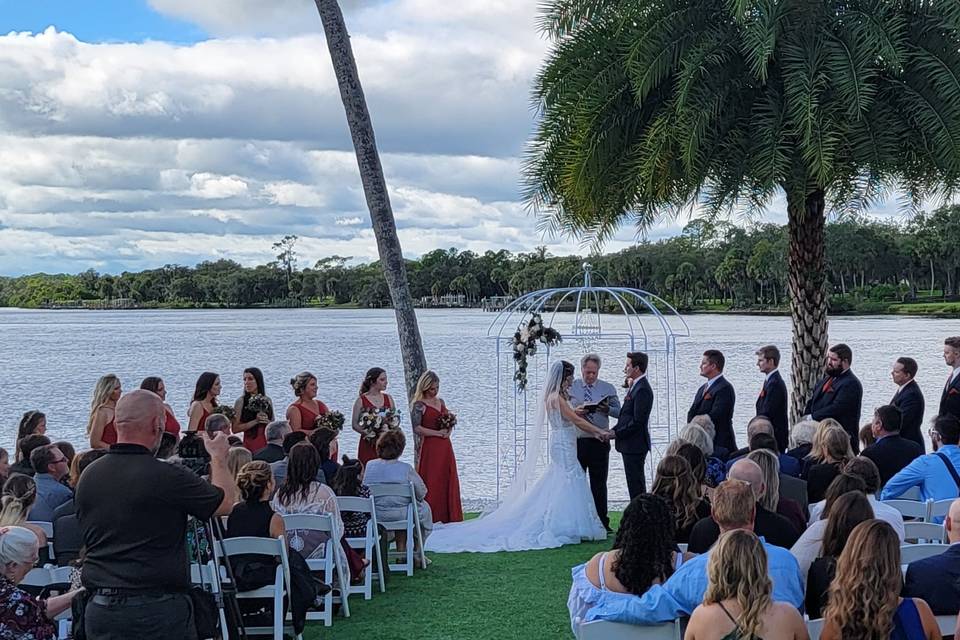 Ceremony with rented arbor