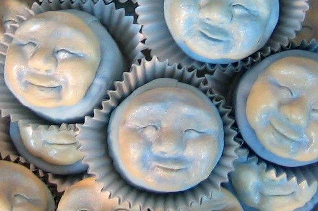 Blue Moon theme New Year's Eve Party.  Lemon Ginger cake-lets with White Chocolate molded faces.