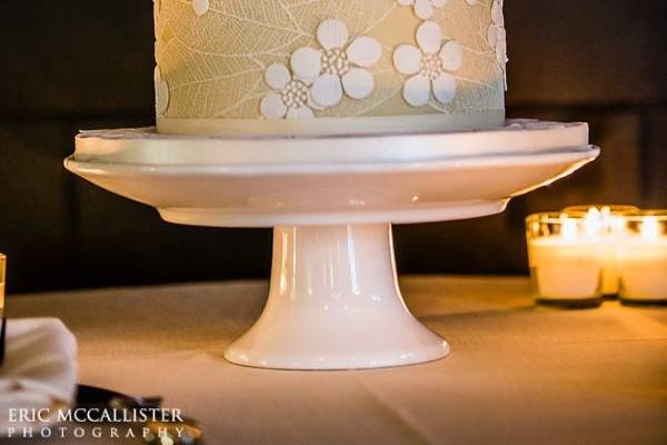 Handcrafted edible Wafer Paper flowers and White Chocolate Lace flowers adorn this beautiful Wedding Cake.