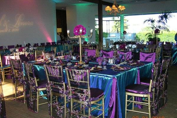 Peacock color was the perfect setting.
Custom chair cover on selected tables (banquet tables) was perfect for this setup...