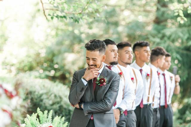 A happy groom with friends