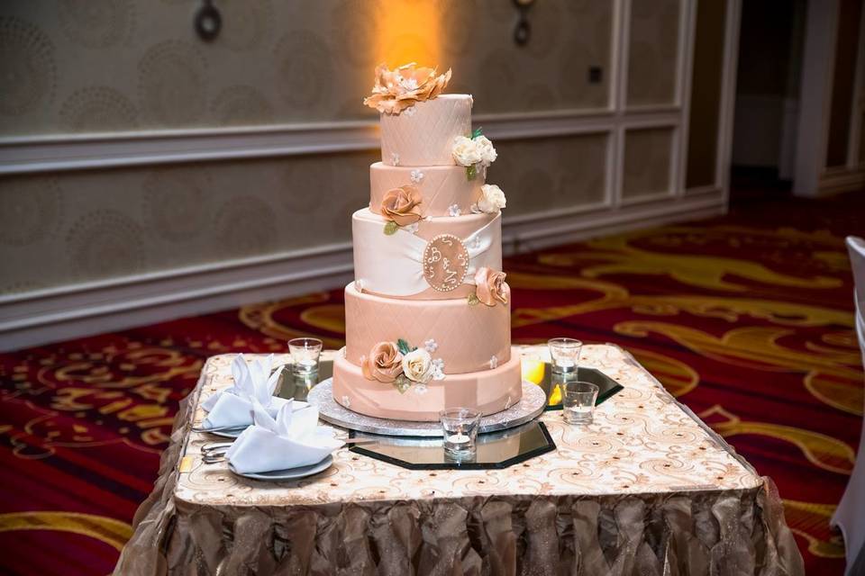 Five tier white and pink cake