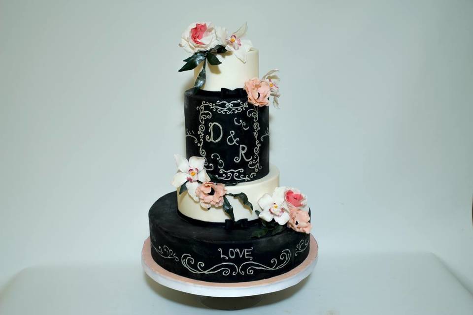 Four tier black and white cake