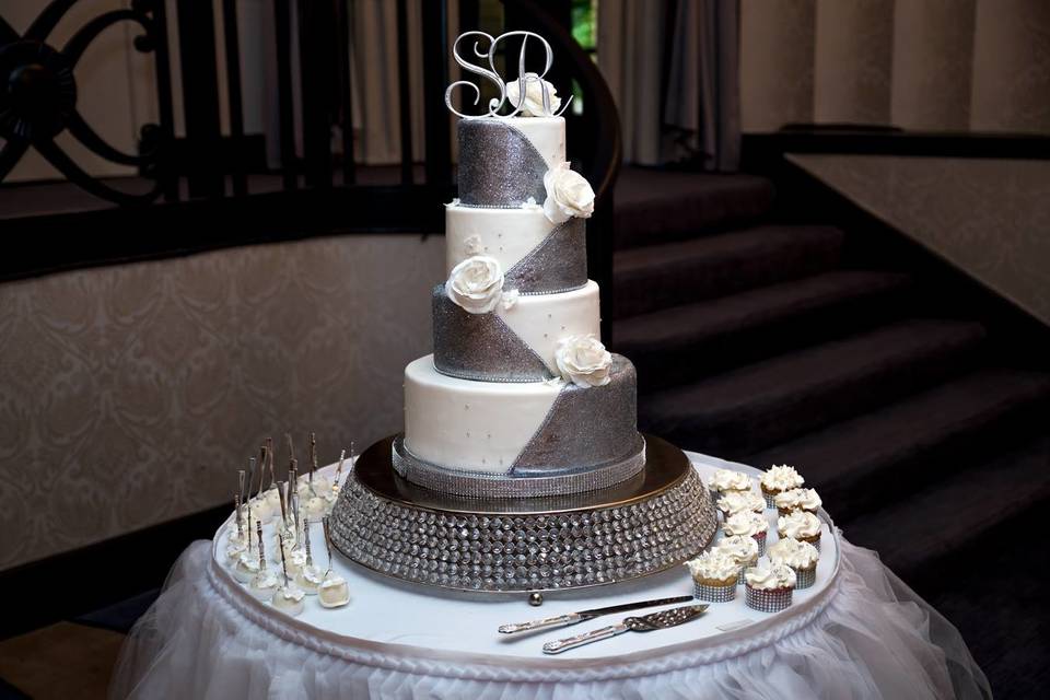 Four tier white and grey cake