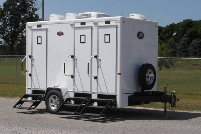 Reception tent and luxury restroom trailer