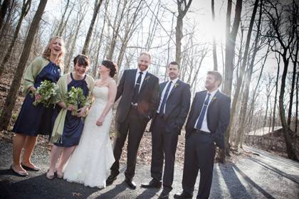 The couple with the bridesmaids and groomsmen