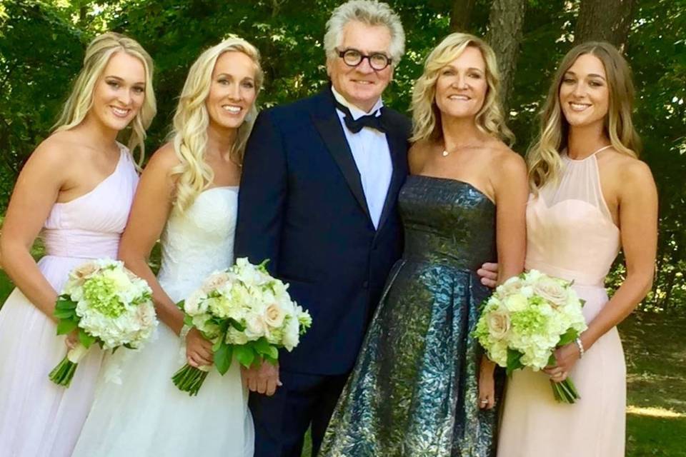 Groom and bride with the bridesmaids