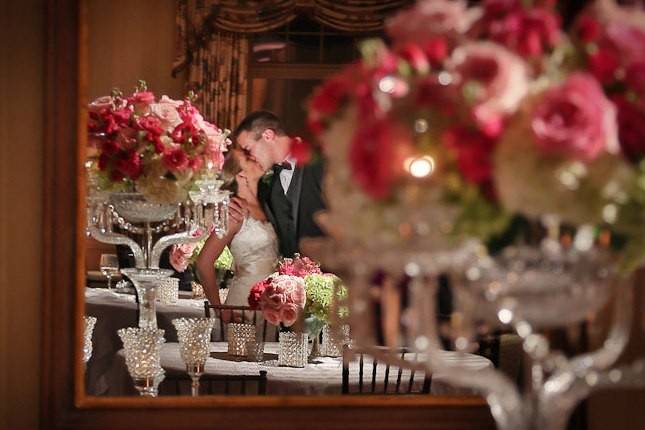 Mirror shot of bride and groom