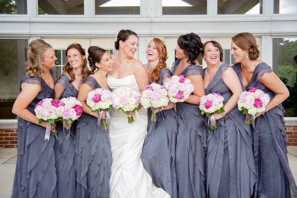 Happy bride with bridesmaids