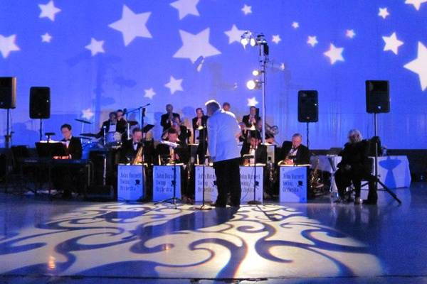 Lighting for a wedding in an airplane hanger by MDM Entertainment.